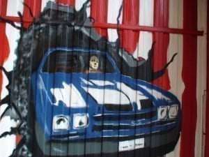 Graffiti comercial en Pamplona - Puerta garage