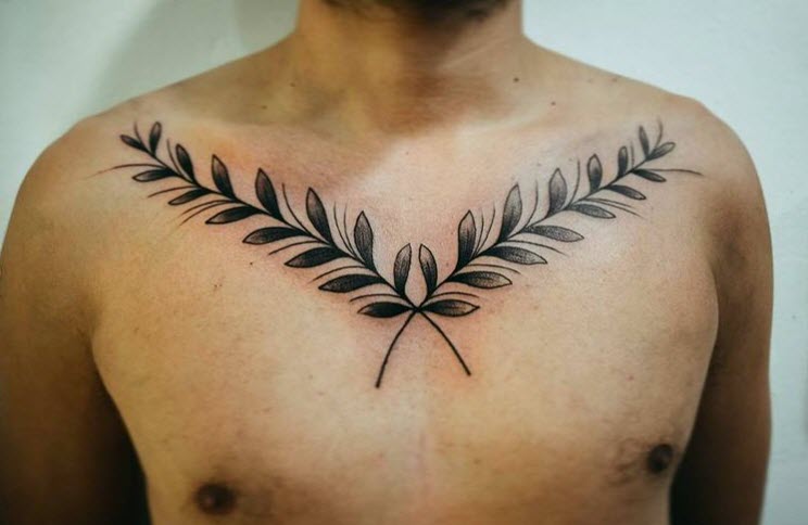 Tatuajes ramas cruzadas en el pecho