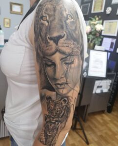 Tatuajes de leones - Tatuajes de una leona en el brazo