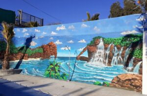Graffiti comercial en Granada - Mural patio piscina